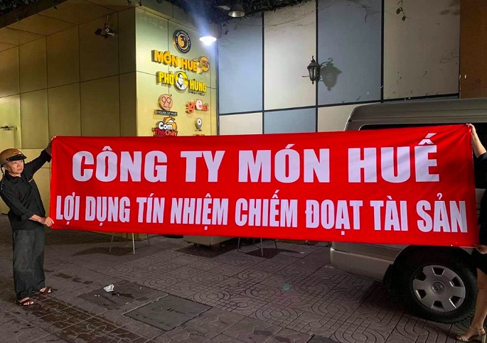 Nhieu cua hang Mon Hue dong cua, tram nha cung cap keo den doi no hinh anh 2