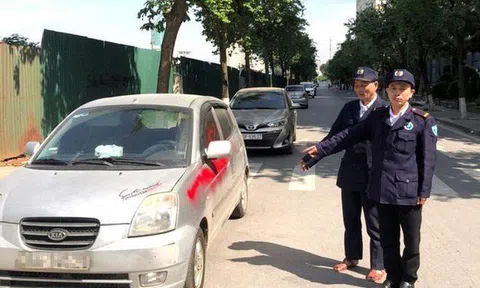Hà Nội: Khởi tố nhóm bảo vệ xịt sơn vào ô tô ở chung cư