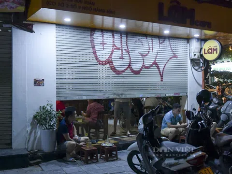 Hà Nội: Phớt lờ lệnh cấm bán hàng sau 21h, nhiều nhà hàng hạ cửa, "nhốt khách" ăn uống phía trong